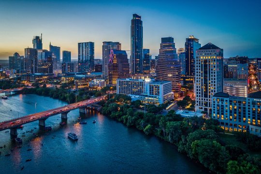 Austin, Texas skyline at dusk overlooking the Colorado River